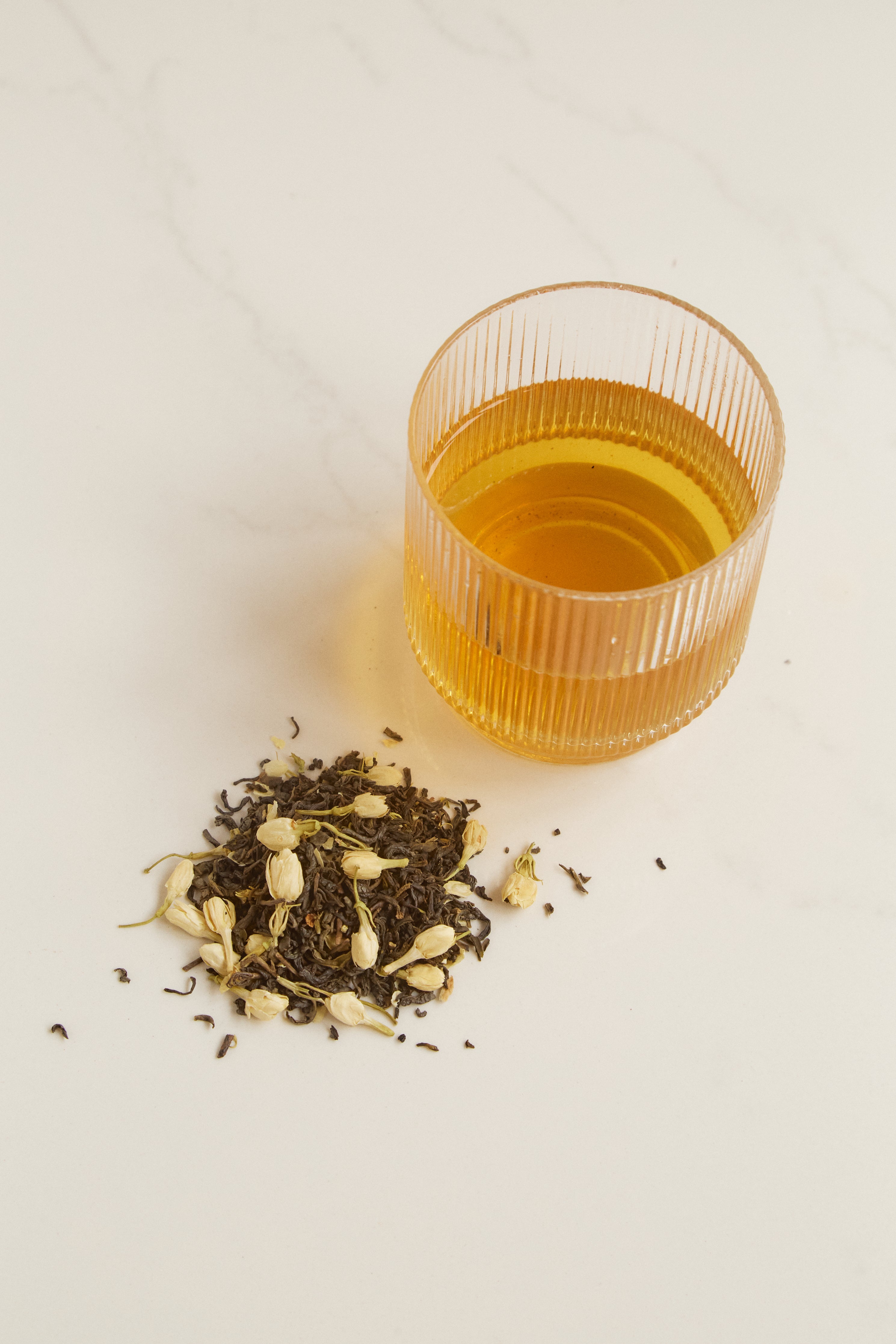 On Sundays green jasmine tea in a glass