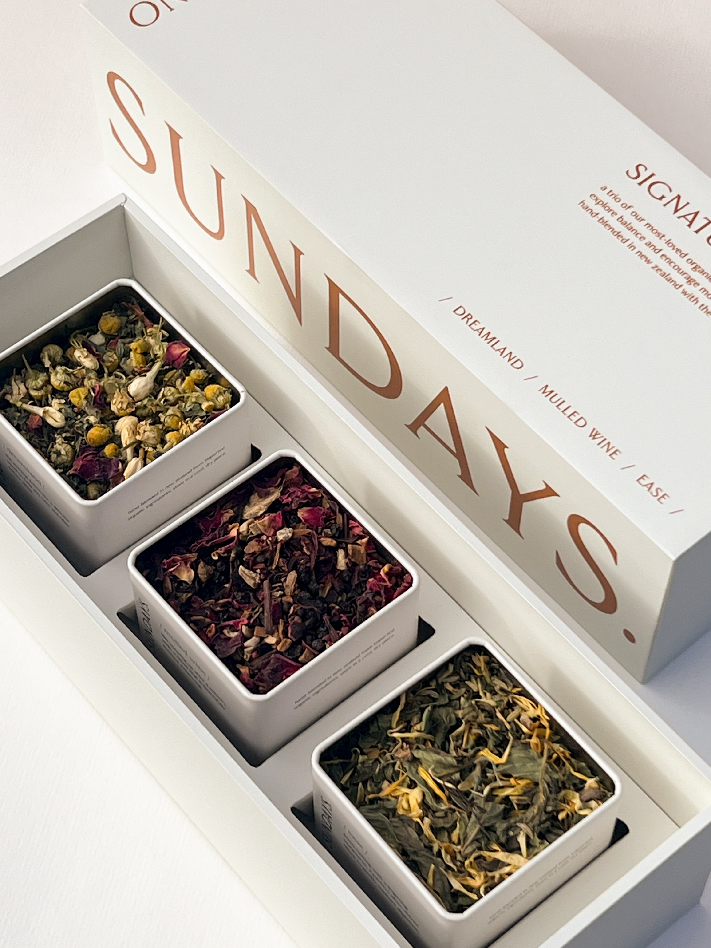 On Sundays signature blends organic loose leaf tea gift set with box and tins open