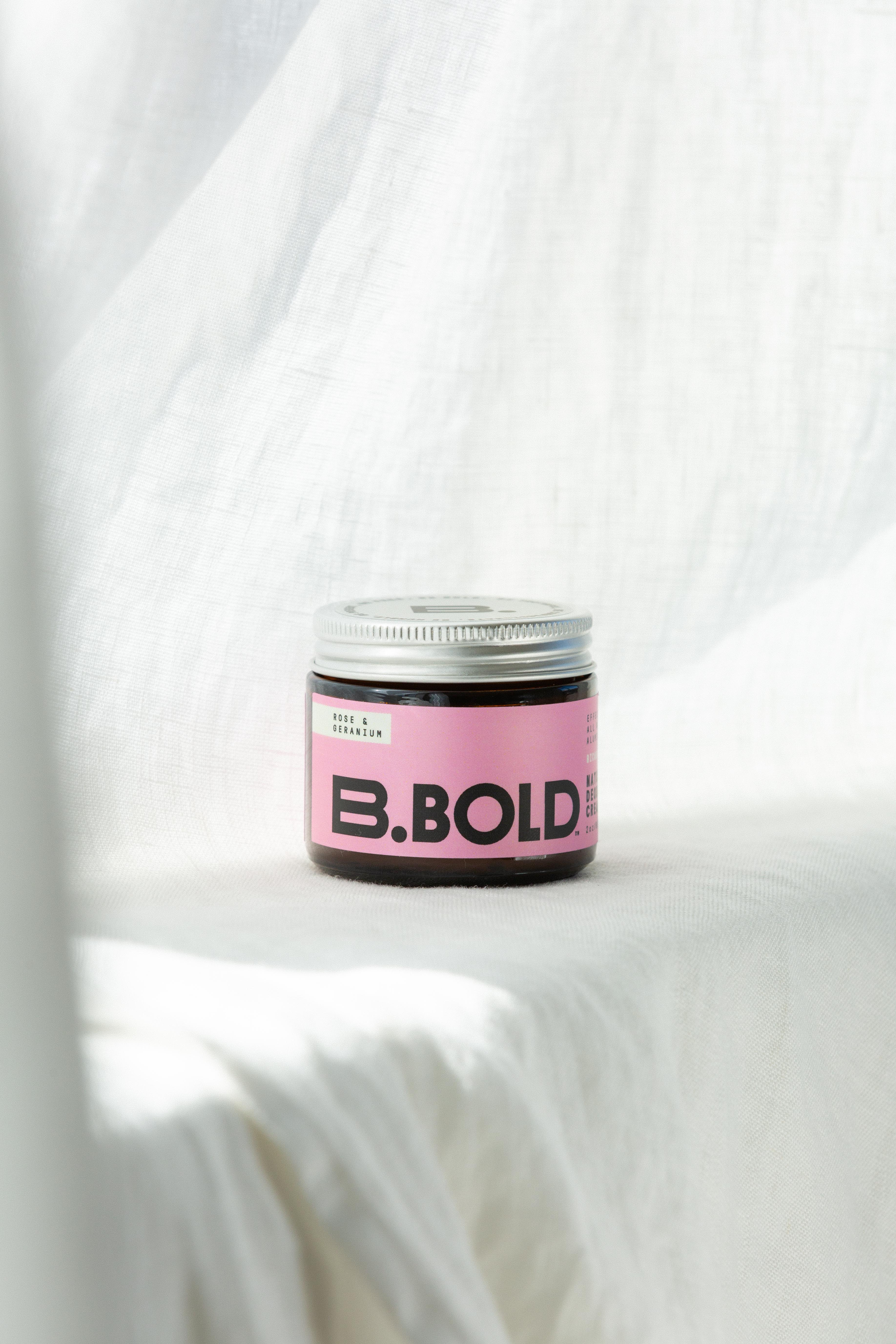 b.bold bicarb free rose and geranium deodorant on white background