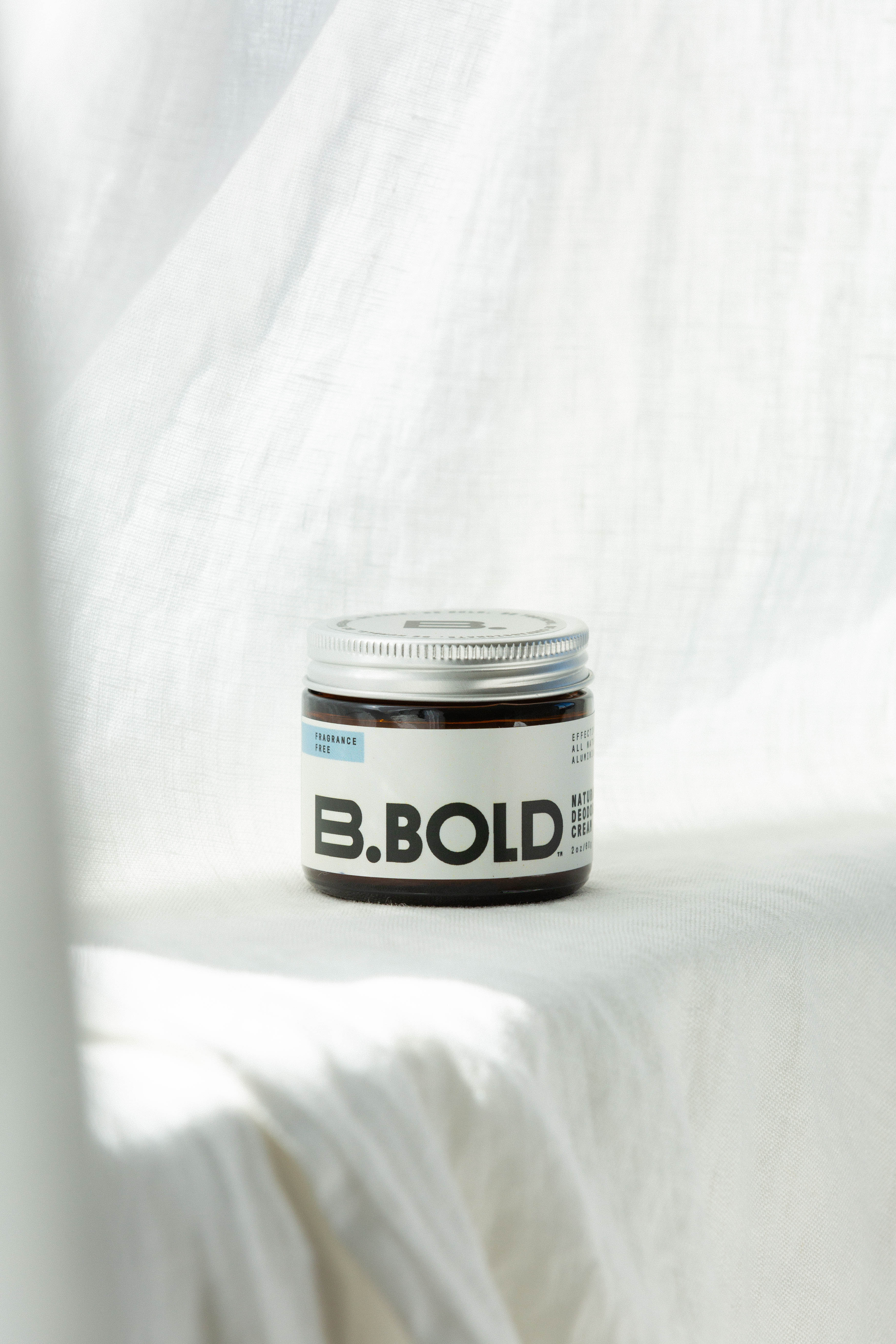B.bold natural fragrance free deodorant on white background