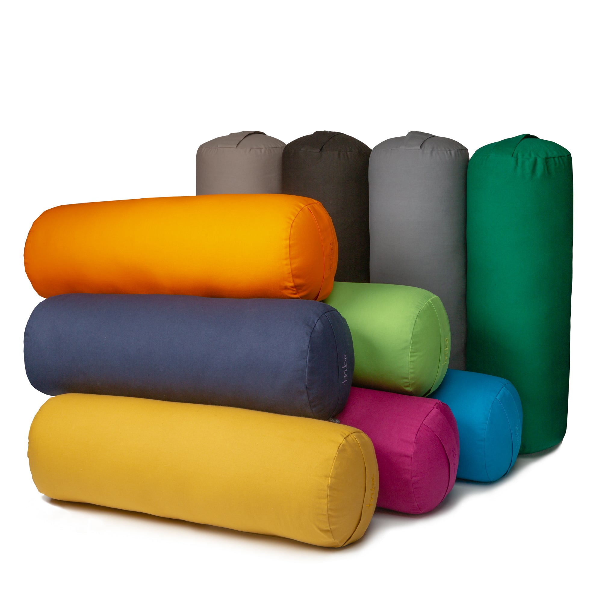 Organic cotton yoga bolsters in various colours on a white background
