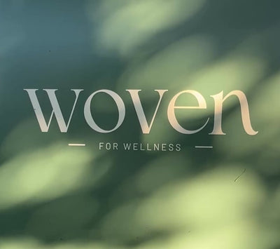 Video of dappled light behind Woven for wellness logo on top
